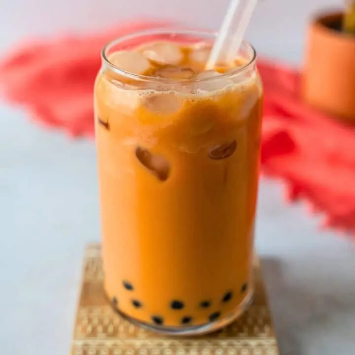 Bright orange Thai tea over ice